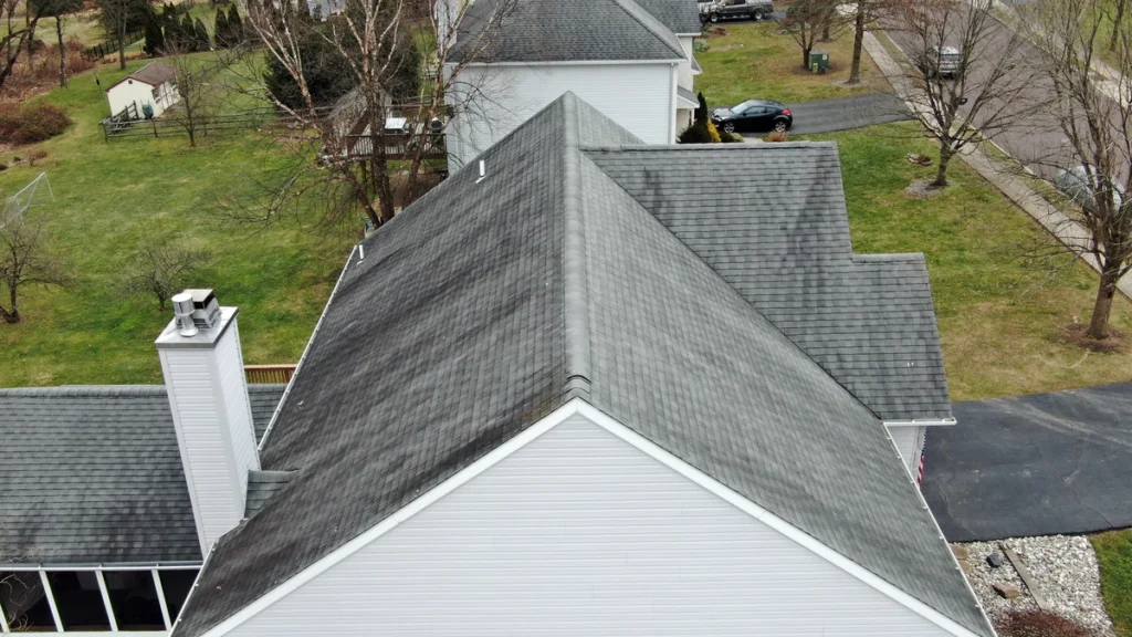 arial view of roof damage before removing shingles