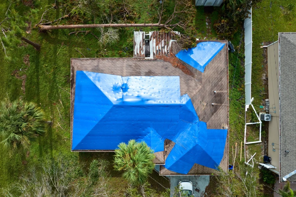 arial photo shows how to tarp a bigger roof