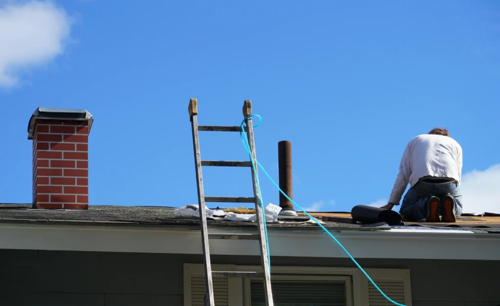 homeowner figures out how to replace roof shingles