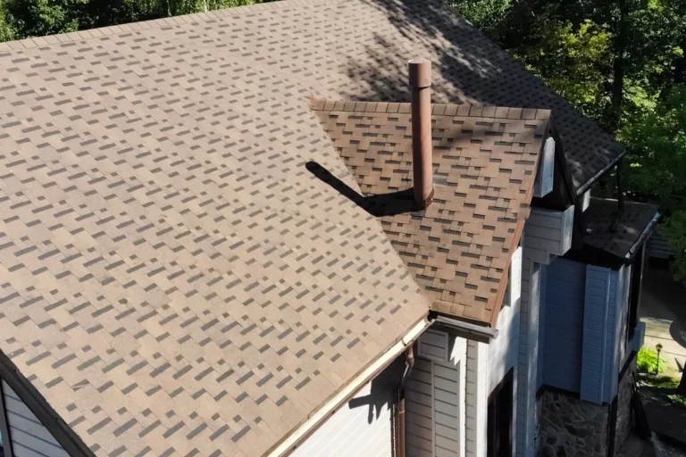 bituminous tile roof of large new house