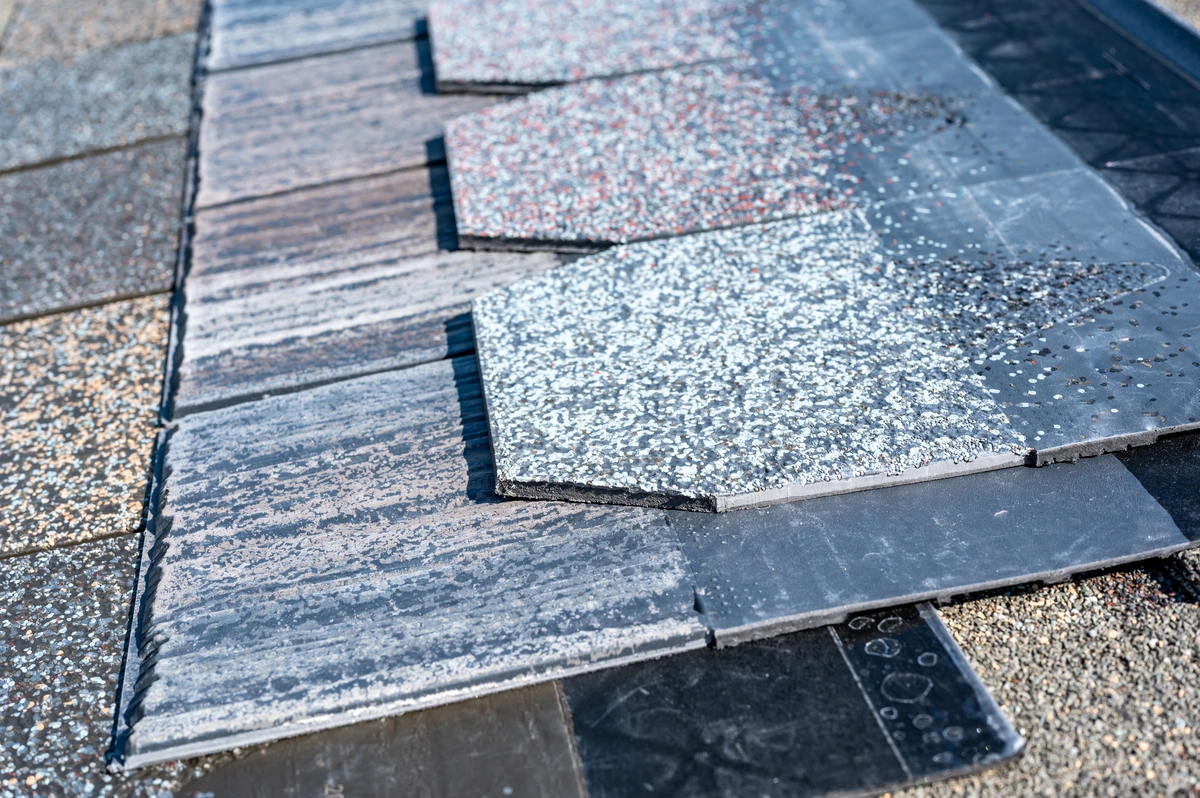 close up of composite shingles laid out on a roof